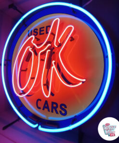 Cartel Neon OK Used Cars on left