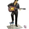 Figura decorazioni sgabello e Elvis con la chitarra