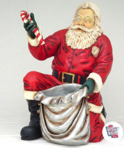 Figurindretning Jul Julenisse knæler med taske