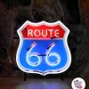 Neon Route 66-skylt med bakgrund